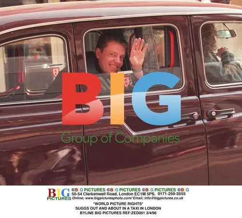 SUGGS out and about in a taxi in London