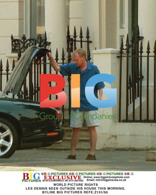 Les Dennis spotted outside his home