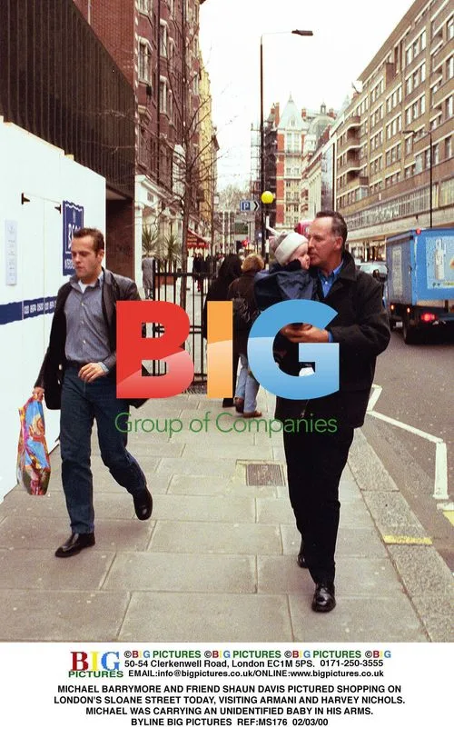 MICHAEL BARRYMORE AND FRIEND PICTURED SHOPPING