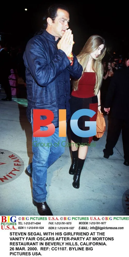 Steven Segal and girlfriend at Oscars after-party