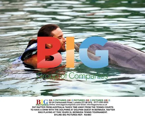 Pat Rafter Swims with Dolphins