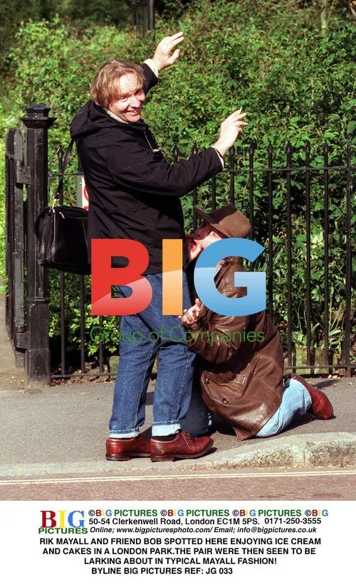 Rik Mayall and Friend Enjoying Park