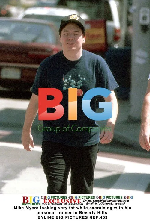 Mike Myers Exercising with Trainer