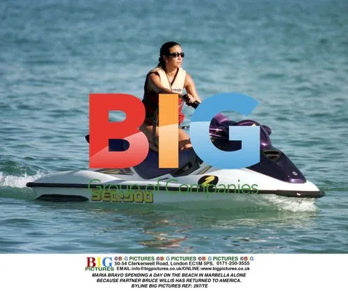 Maria Bravo relaxes on beach in Marbella