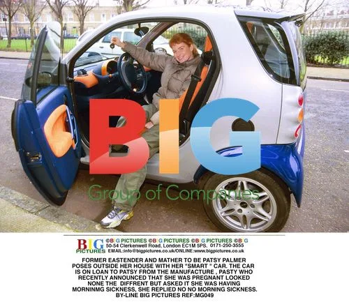 Patsy Palmer Poses with Loaned Smart Car