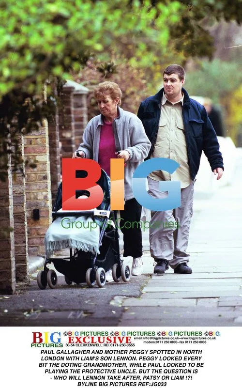 PAUL GALLAGHER AND MOTHER PEGGY OUT WITH LIAM'S SON LENNON