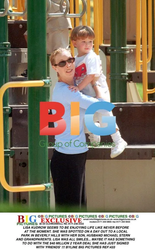 Lisa Kudrow out with family