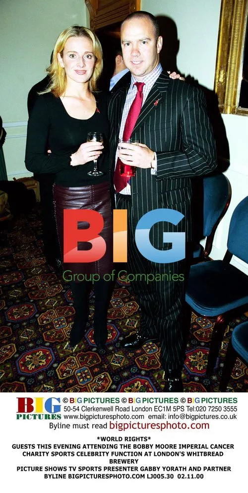 Gabby Yorath and partner at charity event