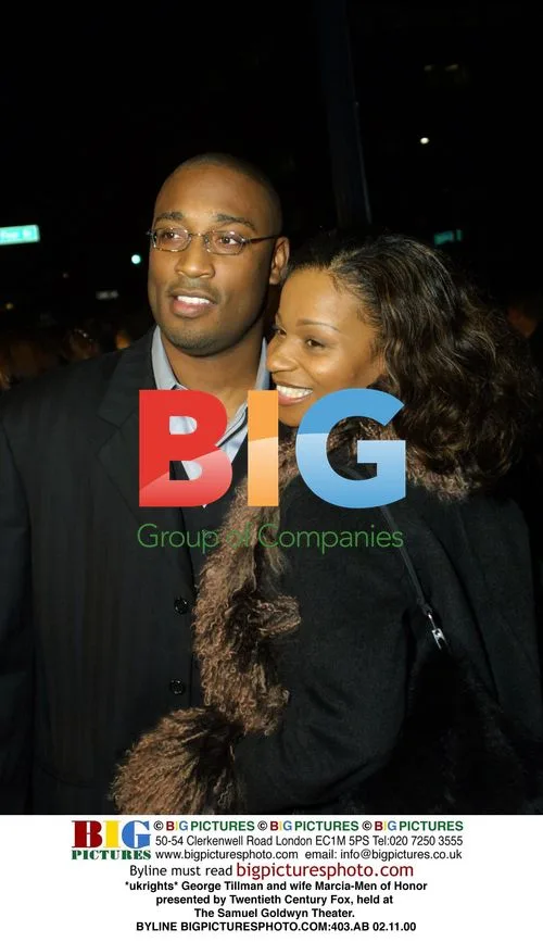 George Tillman and wife at Men of Honor event