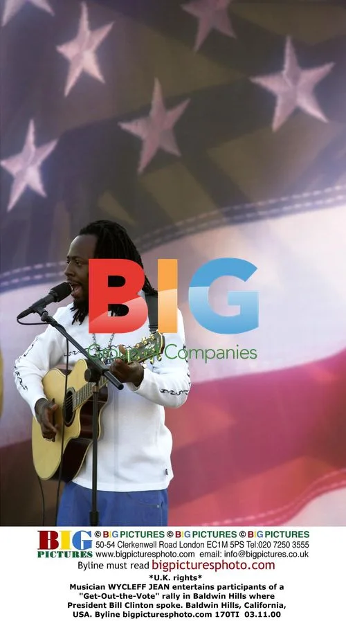 Wycleff Jean Entertains at Clinton Rally