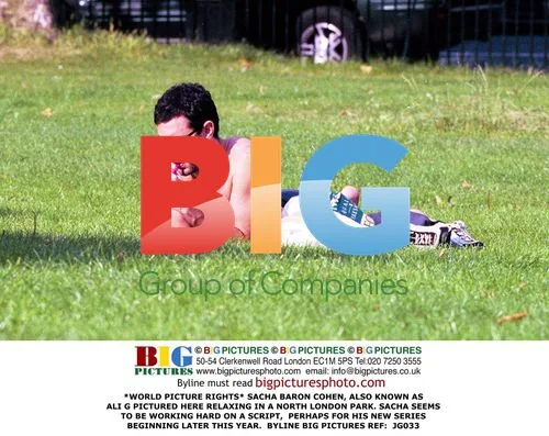 Sacha Baron Cohen Relaxing in Park
