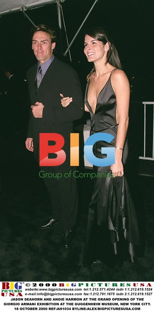 Jason Seahorn and Angie Harmon at Armani Exhibition