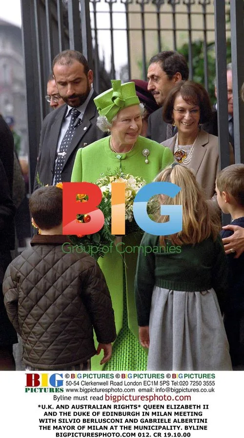 Queen Elizabeth II in Milan with Berlusconi and Mayor