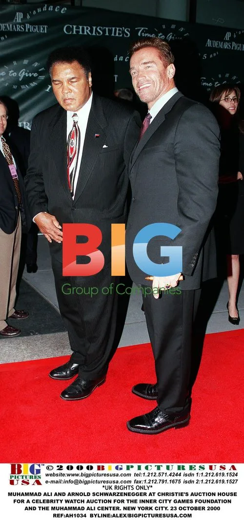 Ali and Schwarzenegger at Celebrity Watch Auction