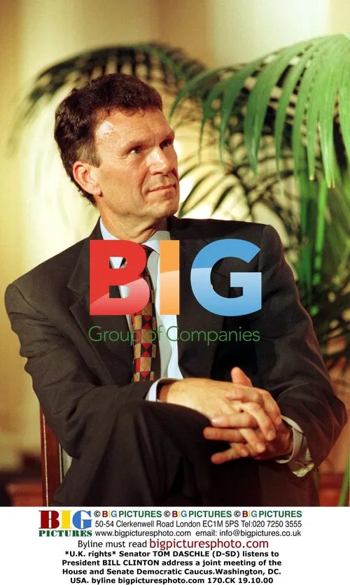 Daschle Listens to Clinton