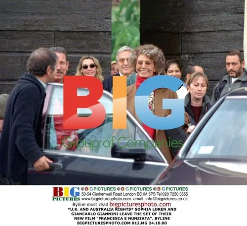 Sophia Loren and Giancarlo Giannini leave film set