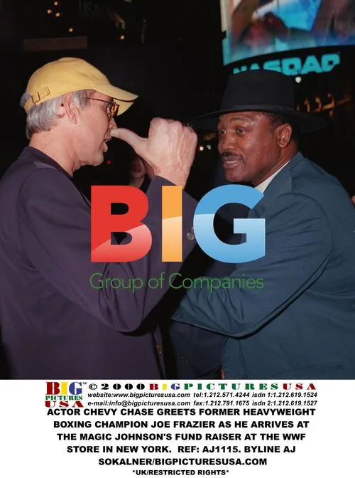 Chevy Chase and Joe Frazier at Magic Johnson event