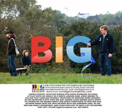 Ewan McGregor Flies Kite with Family in Park