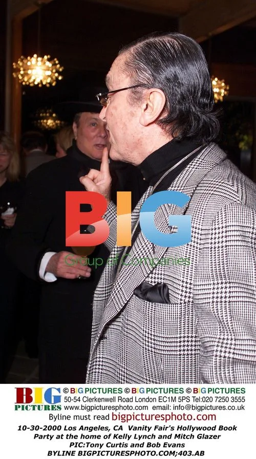 Tony Curtis and Bob Evans at Vanity Fair Party