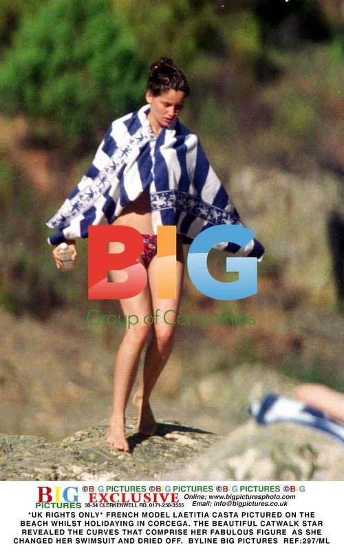 Laetitia Casta Topless on Beach in Corcega
