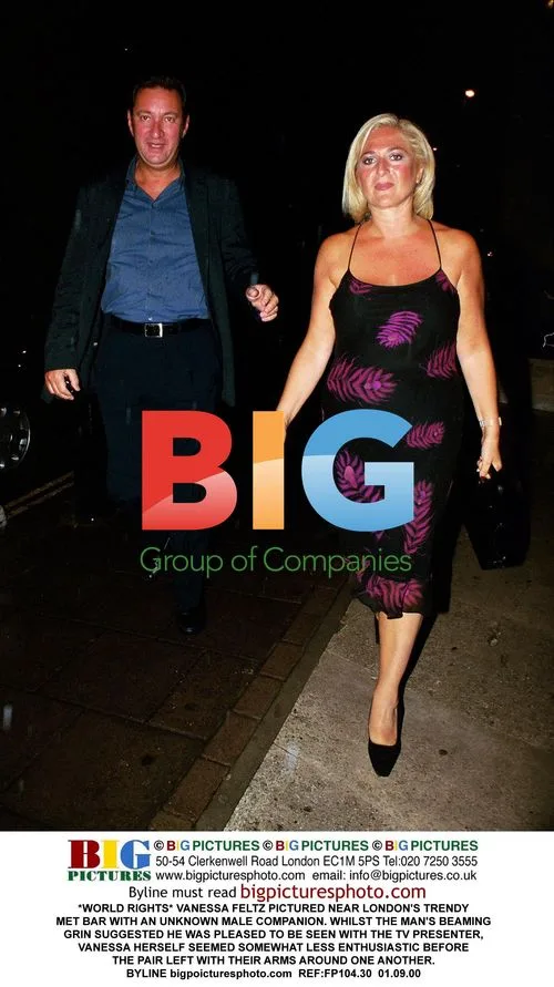 VANESSA FELTZ WITH UNKNOWN COMPANION
