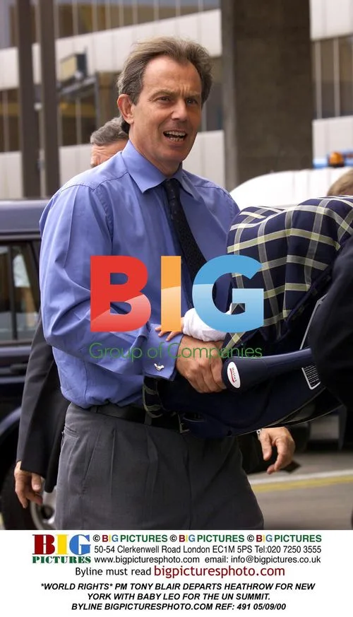 PM Tony Blair departs Heathrow with baby Leo