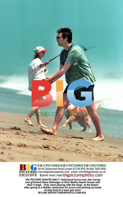 Jim Carrey and Rene Zellweger at Malibu beach