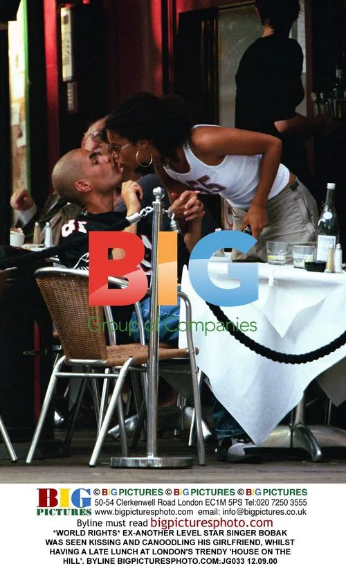Bobak Canoodling with Girlfriend