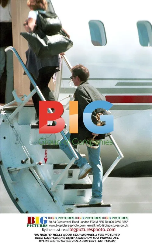 Michael J. Fox Carries Emmy on Private Jet