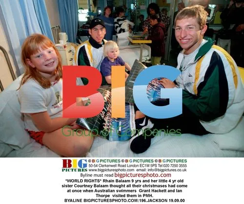 Swimmers Visit Young Patients