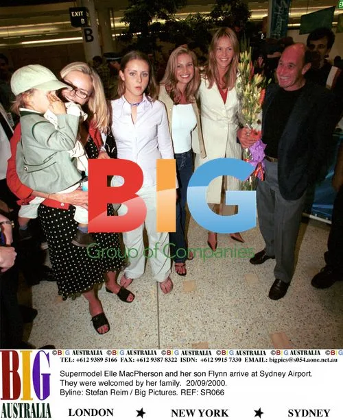 Elle MacPherson and son arrive at Sydney Airport