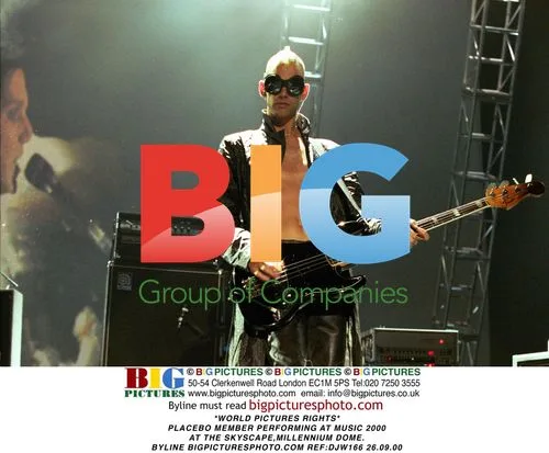 PLACEBO MEMBER PERFORMING AT MUSIC 2000 EVENT