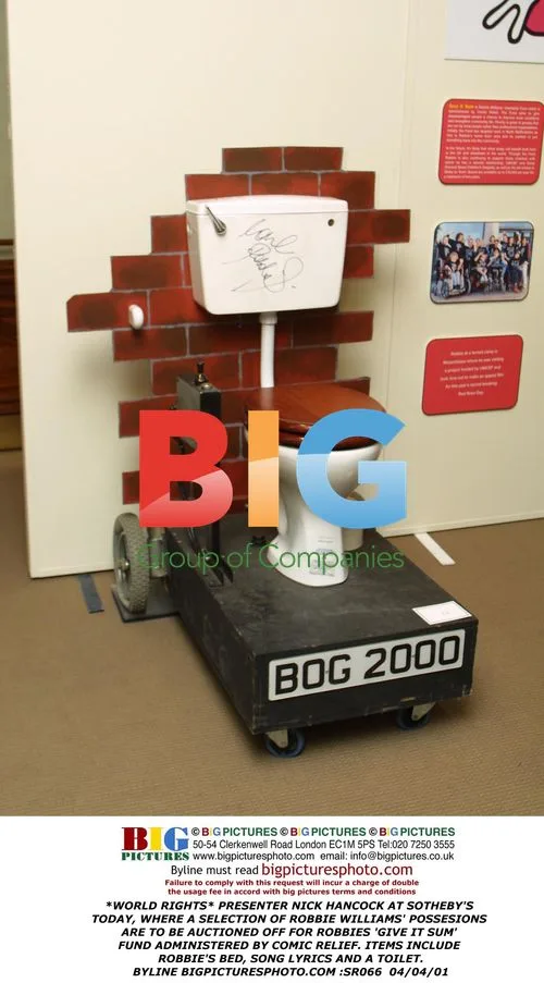 Robbie Williams' Possessions Auctioned