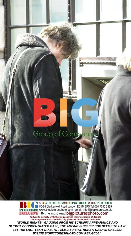 Aging Punk Sir Bob Withdrawing Cash in Chelsea