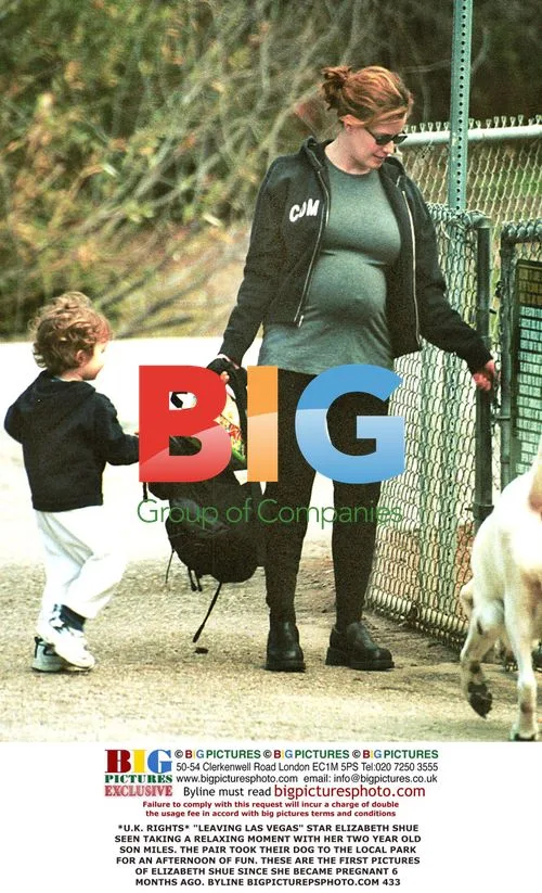 Elizabeth Shue & son Miles at park