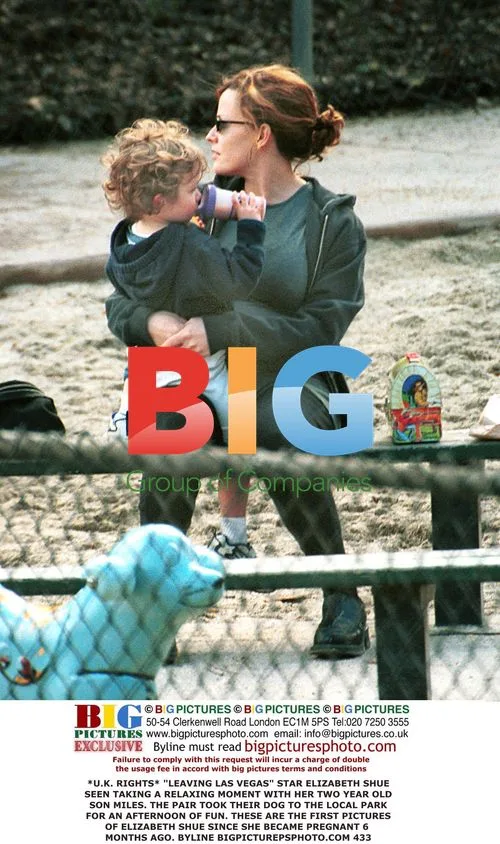 Elizabeth Shue with son Miles at park