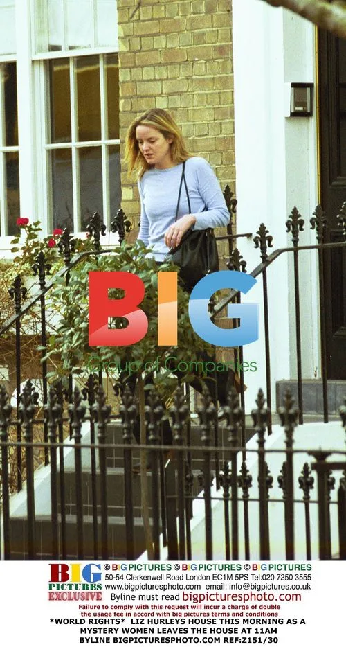 Liz Hurley's House, Mystery Woman Leaves