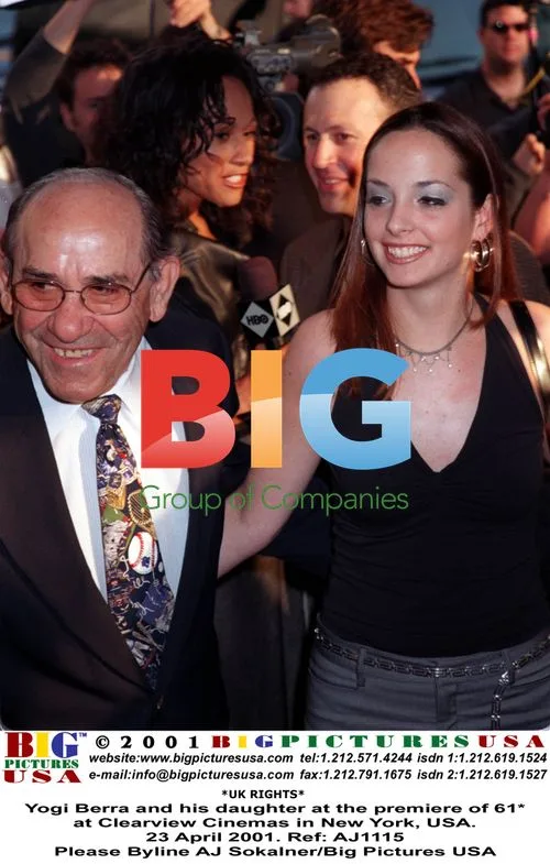 Yogi Berra and daughter at movie premiere