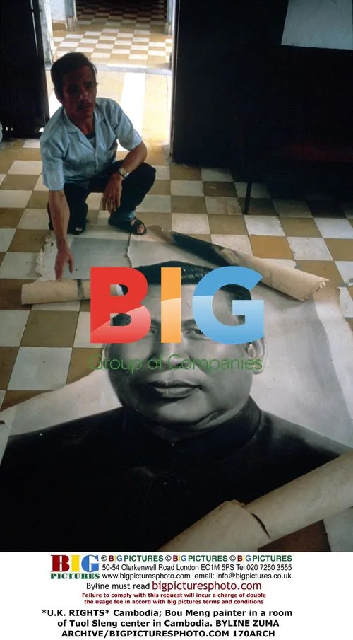 Cambodia's Bou Meng painter at Tuol Sleng center