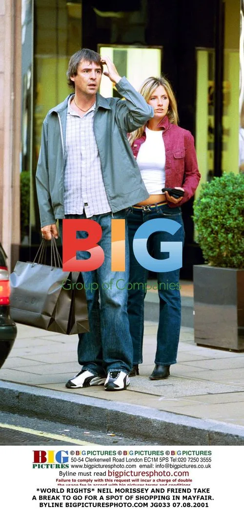Neil Morissey and friend shopping in Mayfair