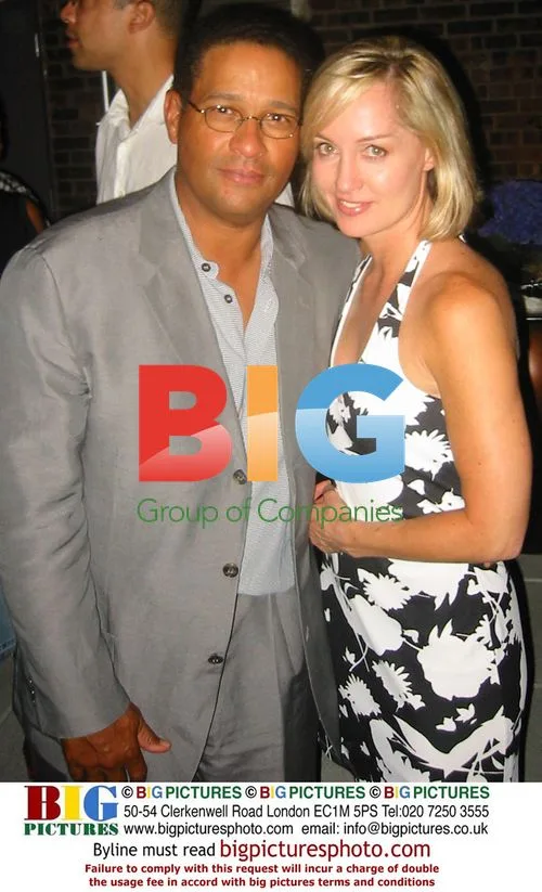 Brian Gumbel & Girlfriend at Luther Vandross Party
