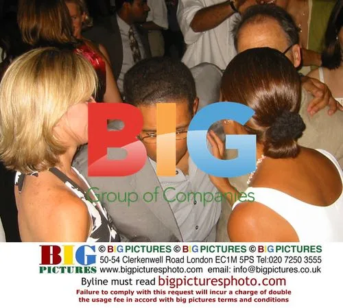 Brian Gumbel & Girlfriend at Luther Vandross Album Party