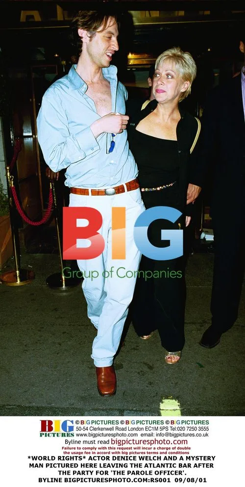 Denice Welch and mystery man at 'The Parole Officer' party