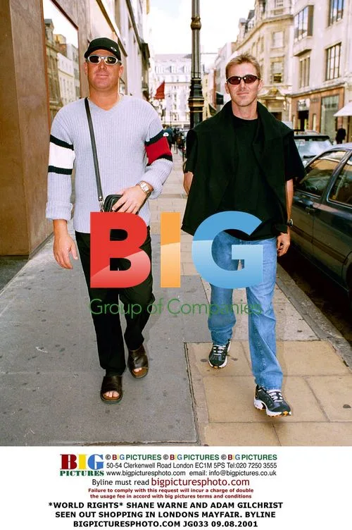 Cricketers Warne and Gilchrist Shopping in London
