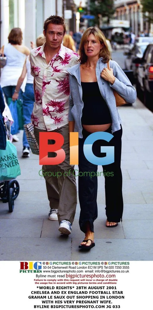 Graham Le Saux and wife shopping in London