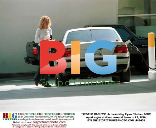 Meg Ryan fuels up her BMW in LA