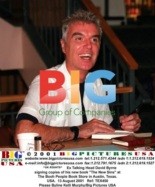 David Byrne signing book copies in Austin