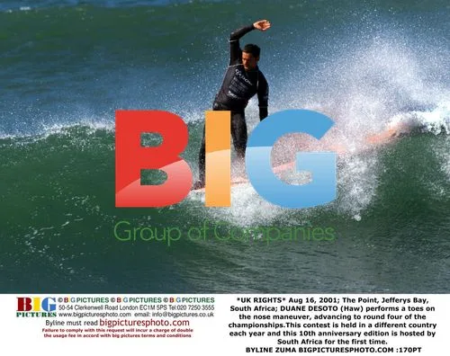 Surfer Performs Toes on the Nose Maneuver