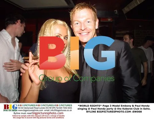 Page 3 Model Embony & Paul Hendy singing at party
