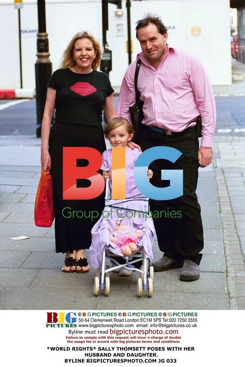 Sally Thomsett with husband and daughter